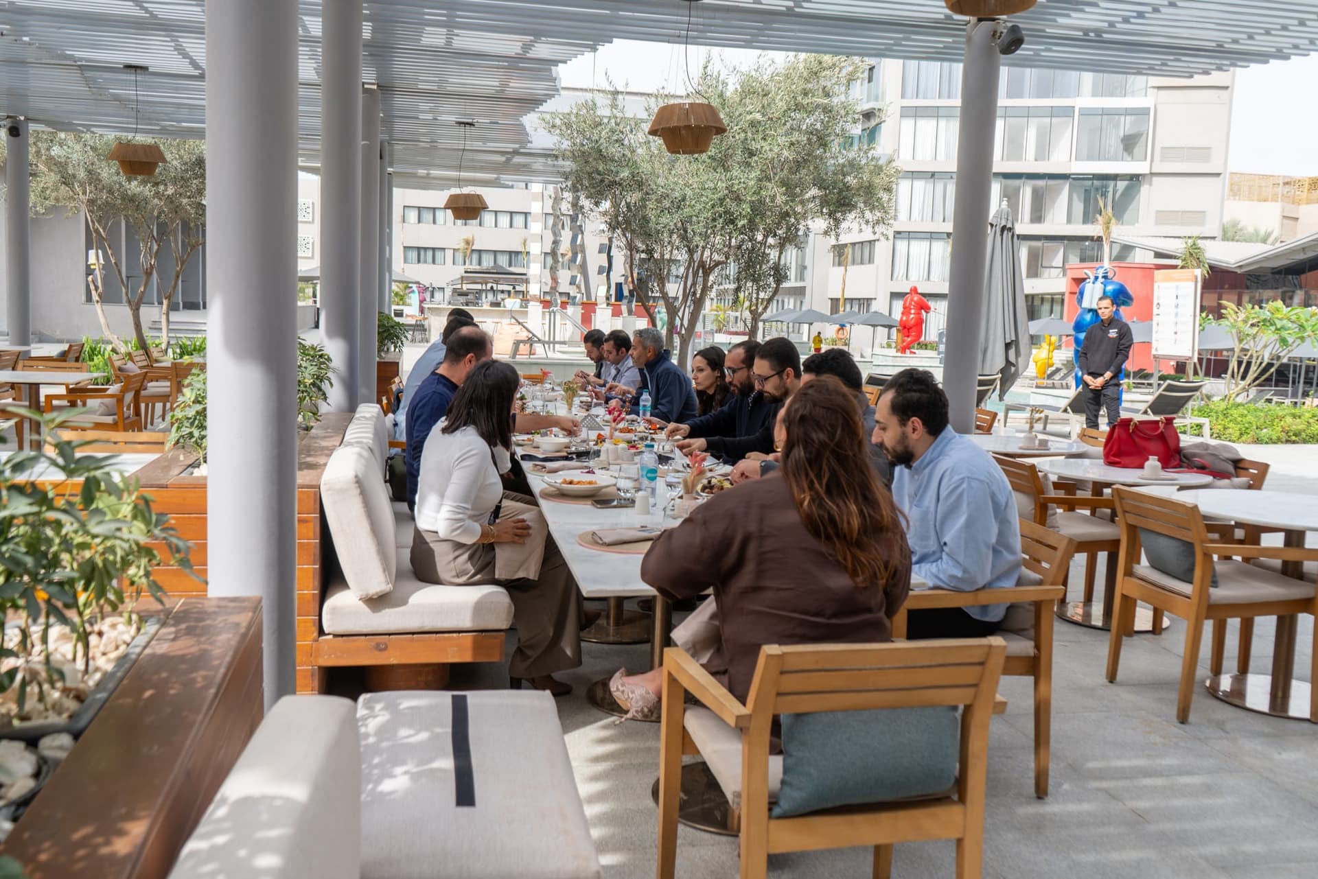 Leadership team dining together outdoors
