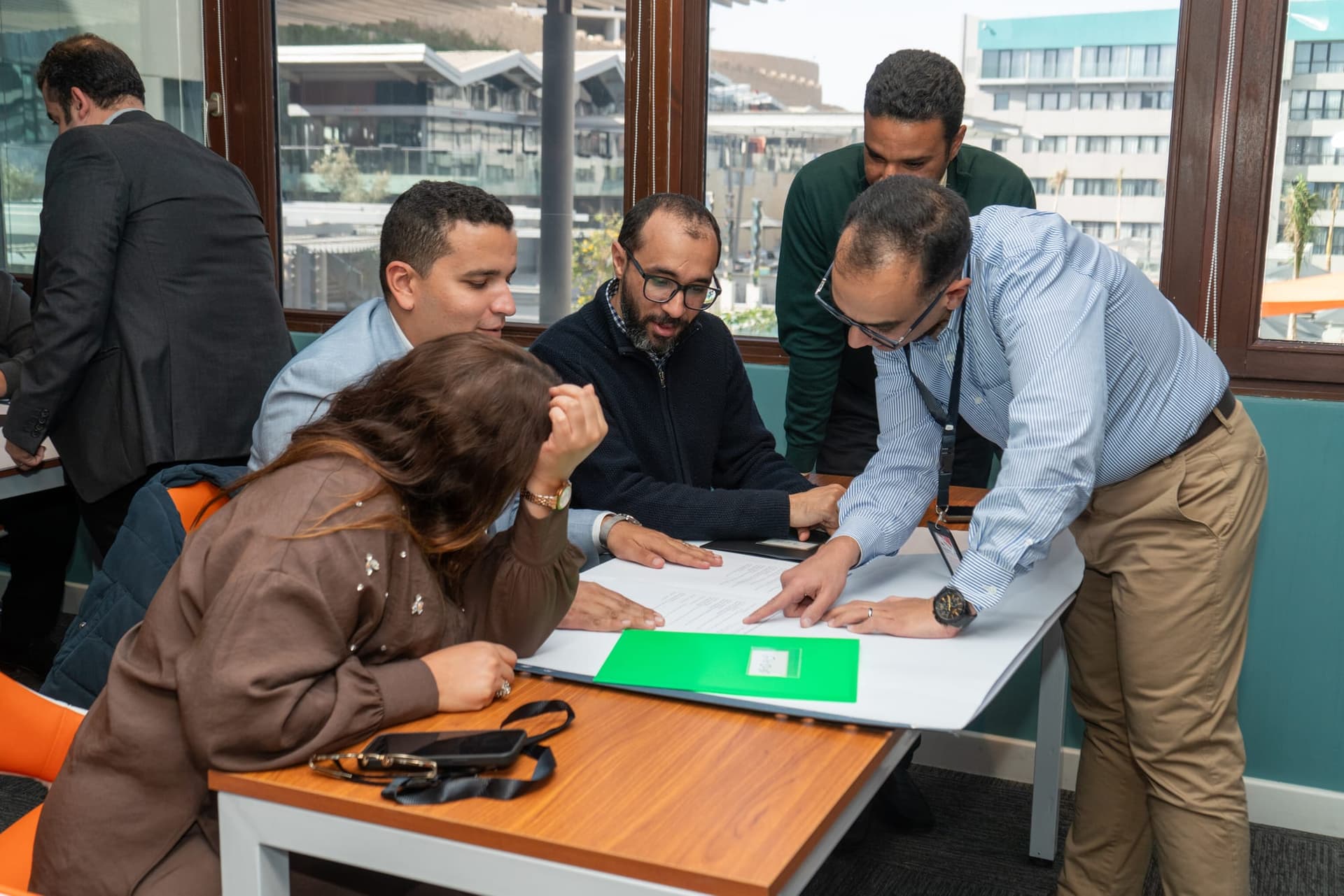 Leaders working through a strategic exercise together